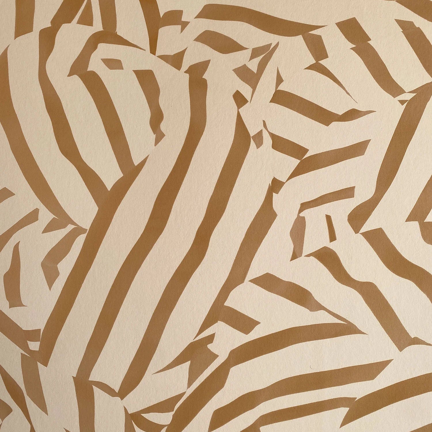 Detail of wallpaper in a playful broken stripe print in brown on a tan field.