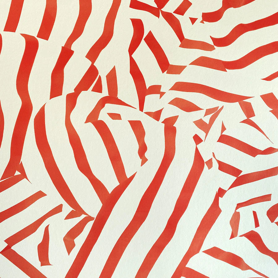 Detail of wallpaper in a playful broken stripe print in red on a cream field.