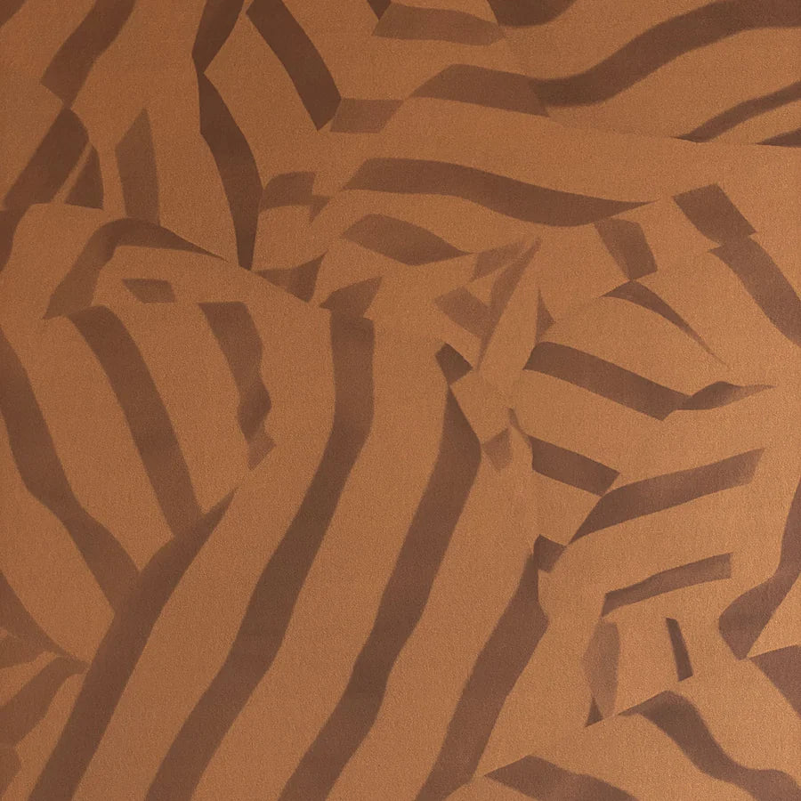 Detail of wallpaper in a playful broken stripe print in dark brown on a brown field.