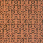 Detail of wallpaper in a linear floral print in red and black on an orange field.