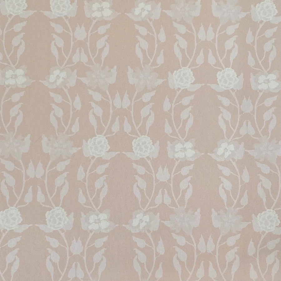 Detail of wallpaper in a linear floral print in white and cream on a light pink field.