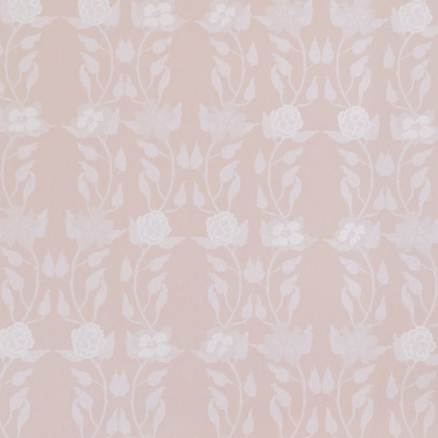 Detail of wallpaper in a linear floral print in white and cream on a light pink field.