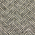 Broadloom carpet swatch in a zig zag pattern medium grey color