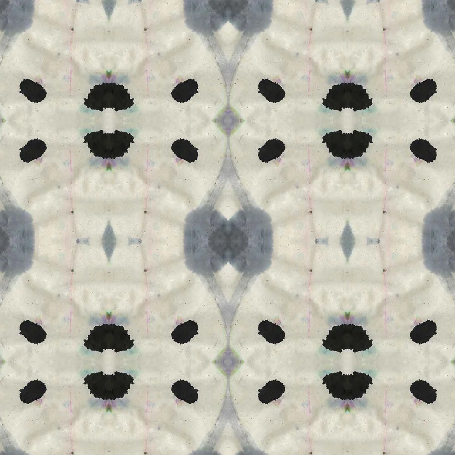 Detail of wallpaper in an abstract ink blot print in shades of charcoal and black on a tan field.