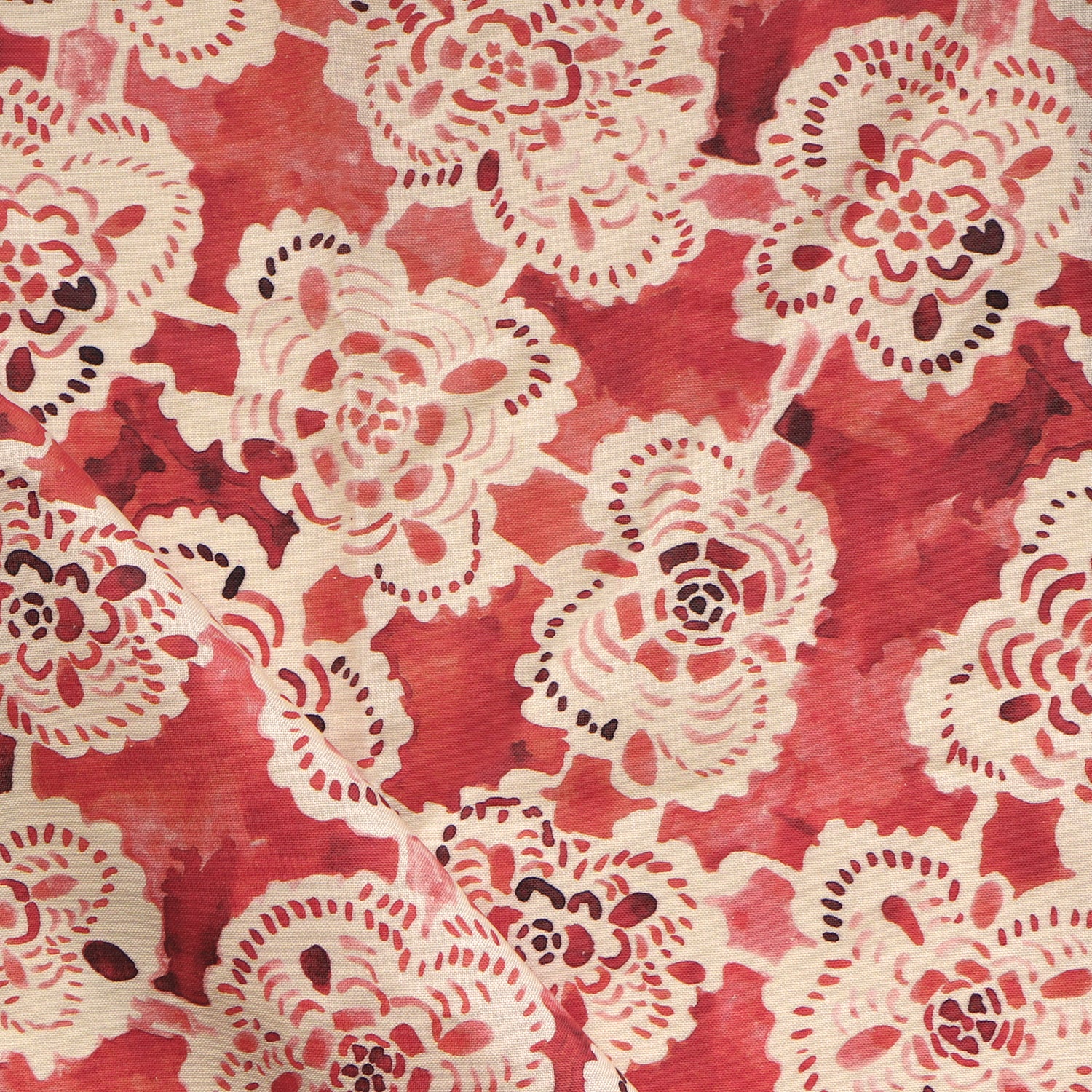 White lace floral patterns on a red textured background