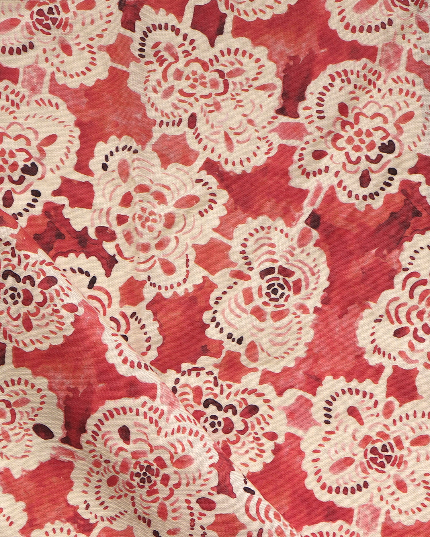 White lace floral patterns on a red textured background