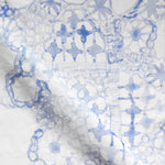 Textile with blue floral pattern on a white background