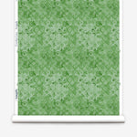 Green floral patterned paper with a white border