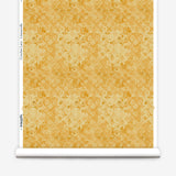 Wallpaper roll with yellow watercolor floral pattern on a white background.