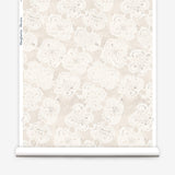 Wallpaper roll with beige watercolor lace floral pattern on a white background.