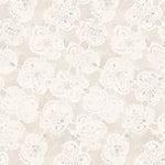 White lace pattern on a beige background