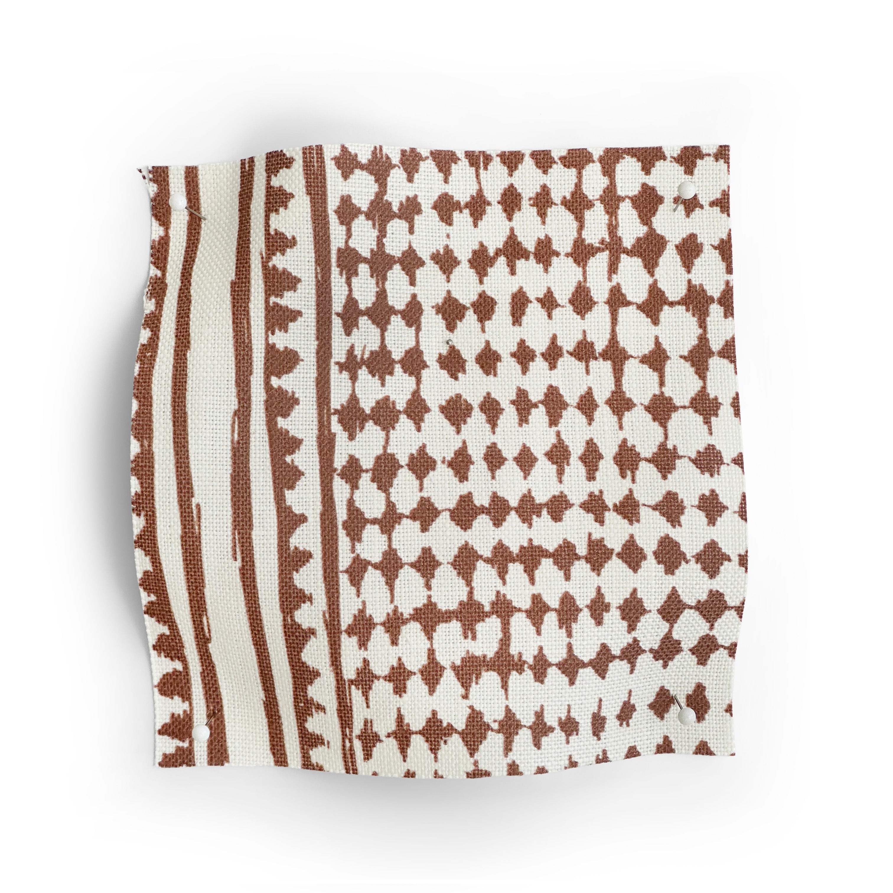 Textile with brown and white geometric pattern on a white background