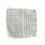Patterned fabric swatch with blue and white geometric design on a white background