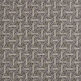 Detail of fabric in a geometric grid pattern in black on a cream field.