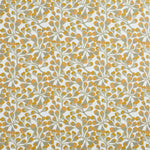 Detail of fabric in an abstract botanical print in gold and gray on a white field.