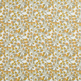 Detail of fabric in an abstract botanical print in gold and gray on a white field.