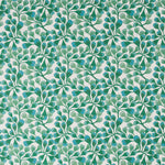 Detail of fabric in an abstract botanical print in green and turquoise on a white field.