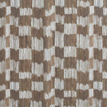 Detail of fabric in an abstract check print in shades of brown and gray.