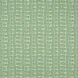 Detail of fabric in a playful curvy grid print in green on a white field.