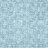 Detail of fabric in a playful curvy grid print in blue on a white field.