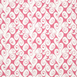 Detail of fabric in a playful abstract shape print in white on a pink field.