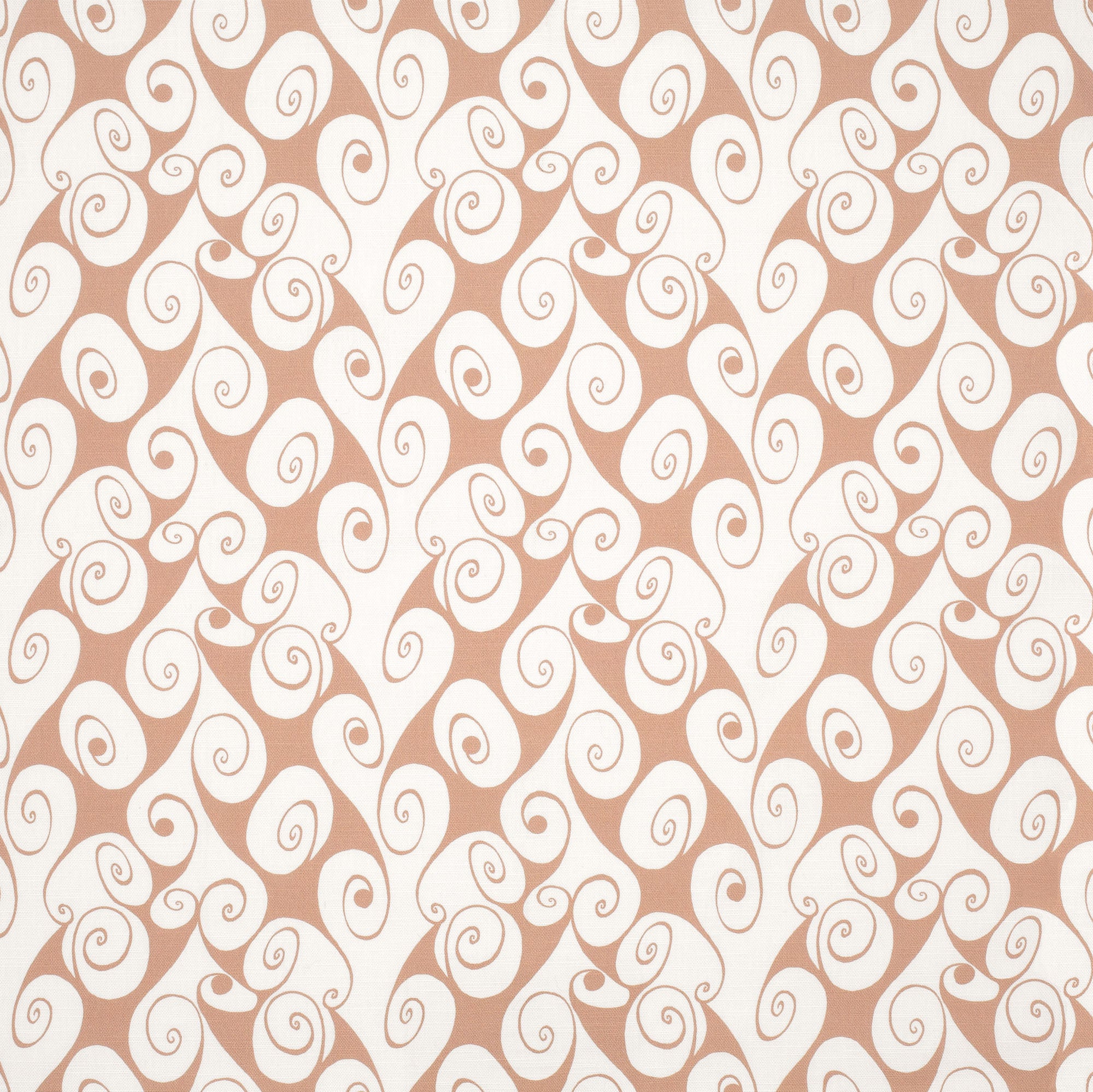 Detail of fabric in a playful abstract shape print in white on a peach field.