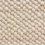 Broadloom carpet swatch in a textural pattern in a ivory design