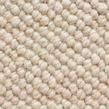 Broadloom carpet swatch in a textural pattern in a ivory design