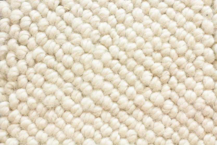 Broadloom carpet swatch in a textural pattern in a white design