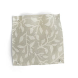 Fabric swatch with leaf pattern in pale grey on a white background