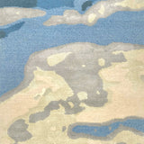 Handknotted rug in an abstract watercolor design in shades of blue, grey and cream.