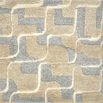 Handknotted rug in a contemporary ripple design in silver, champagne and cream.