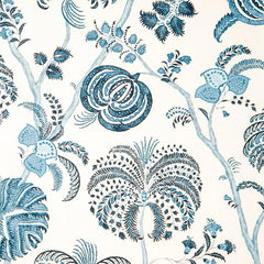 Wallpaper swatch with delicate navy and blue floral, branch and leaf patterns on a cream background.