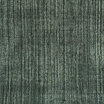 Broadloom carpet swatch in a solid pattern in a green design