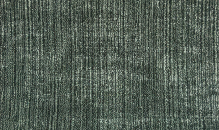 Broadloom carpet swatch in a solid pattern in a green design