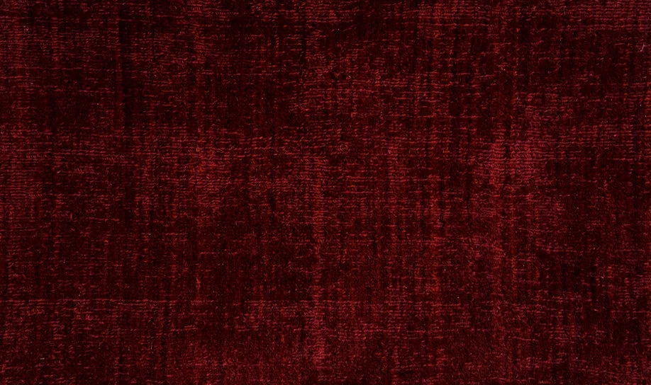 Broadloom carpet swatch in a solid pattern in a red design