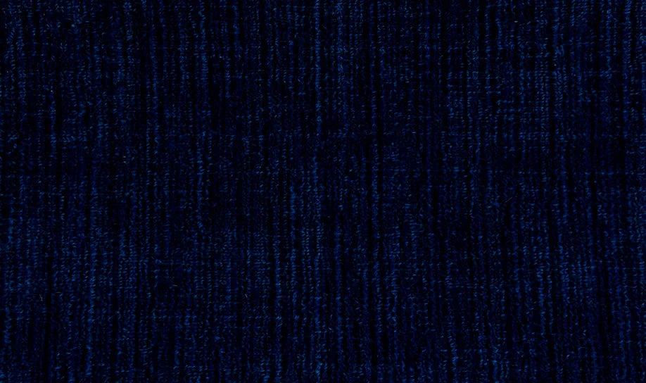 Broadloom carpet swatch in a solid pattern in a dark blue design