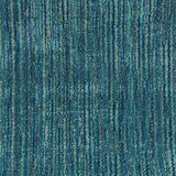 Broadloom carpet swatch in a solid pattern in a turquoise design