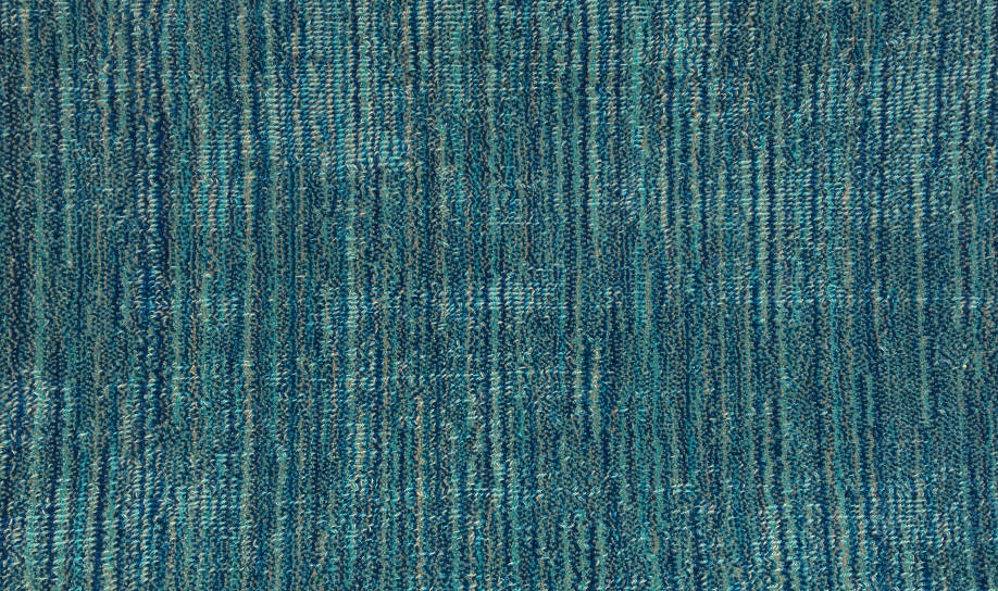 Broadloom carpet swatch in a solid pattern in a turquoise design