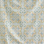 Detail of fabric in a painterly grid print in shades of blue and orange on a cream field.