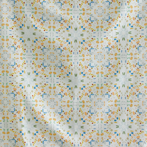 Detail of fabric in a painterly grid print in shades of blue and orange on a cream field.