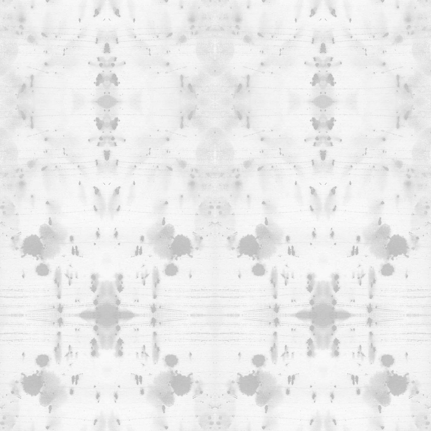 Detail of wallpaper in an abstract ink blot print in gray on a white field.