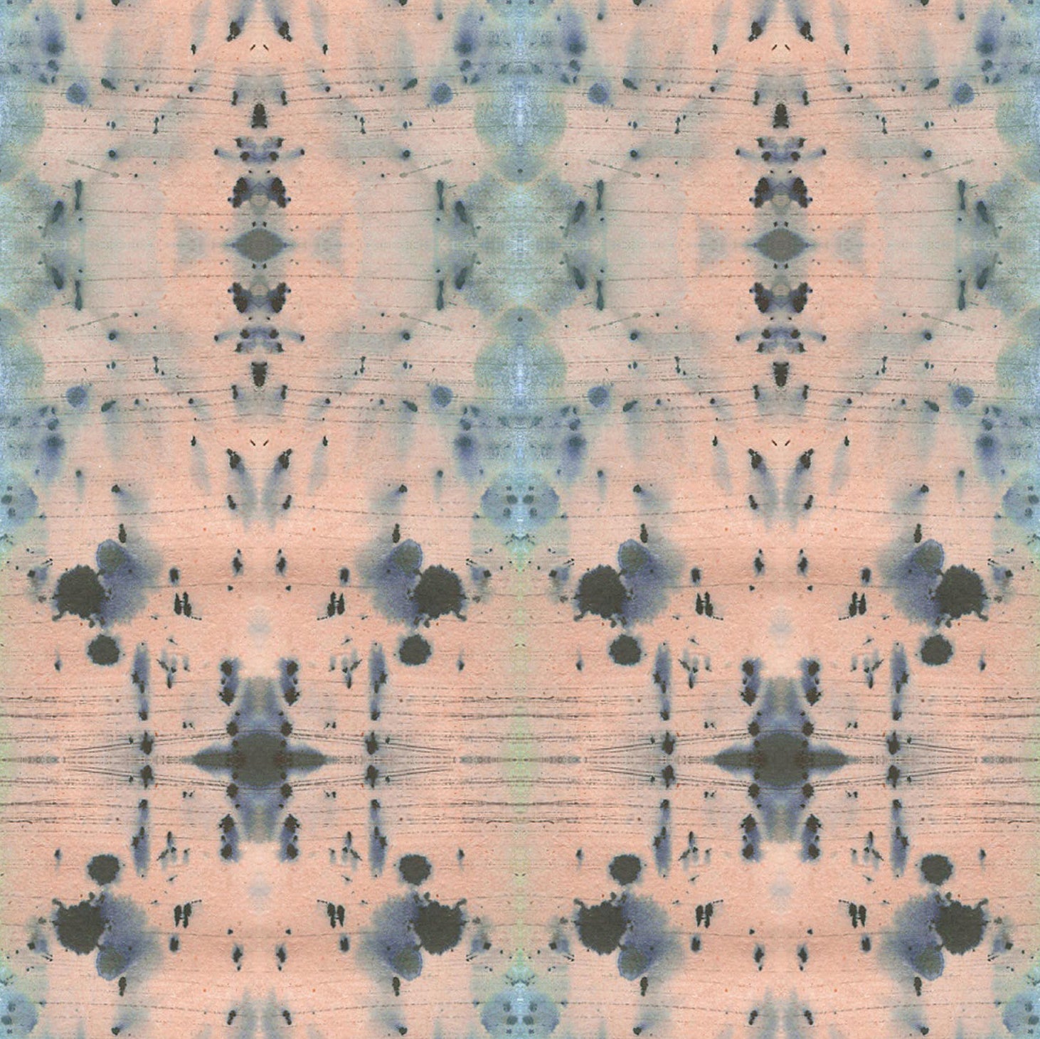Detail of wallpaper in an abstract ink blot print in blue and gray on a light pink field.