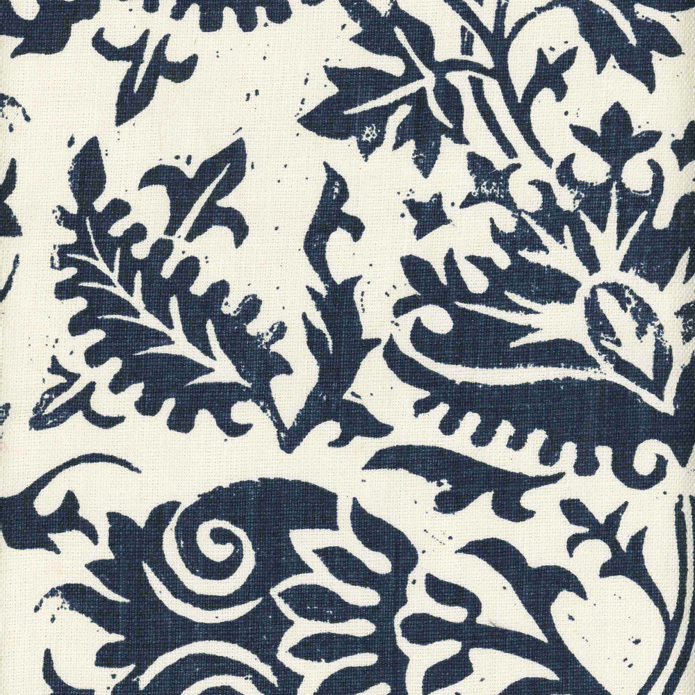 Detail of fabric in a floral damask print in navy on a cream field.