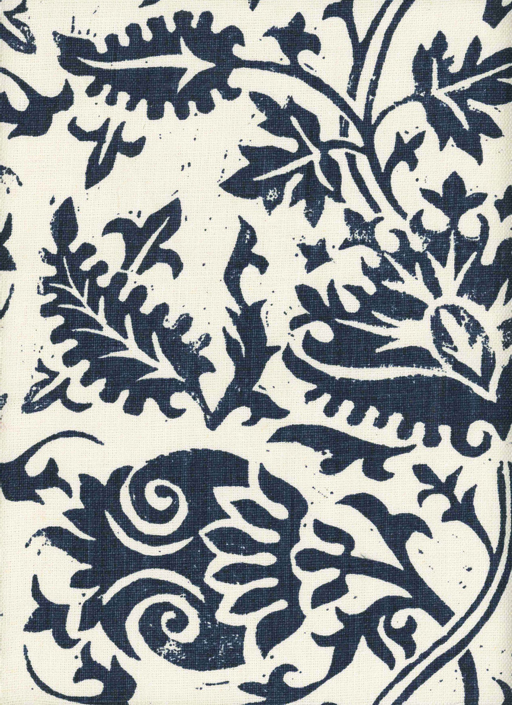 Detail of fabric in a floral damask print in navy on a cream field.