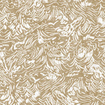 Detail of wallpaper in a painterly wave print in white on a light brown field.