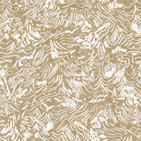 Detail of fabric in a painterly wave print in white on a tan field.