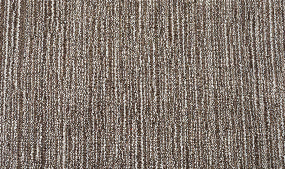 Broadloom carpet swatch in a striped pattern in a brown design