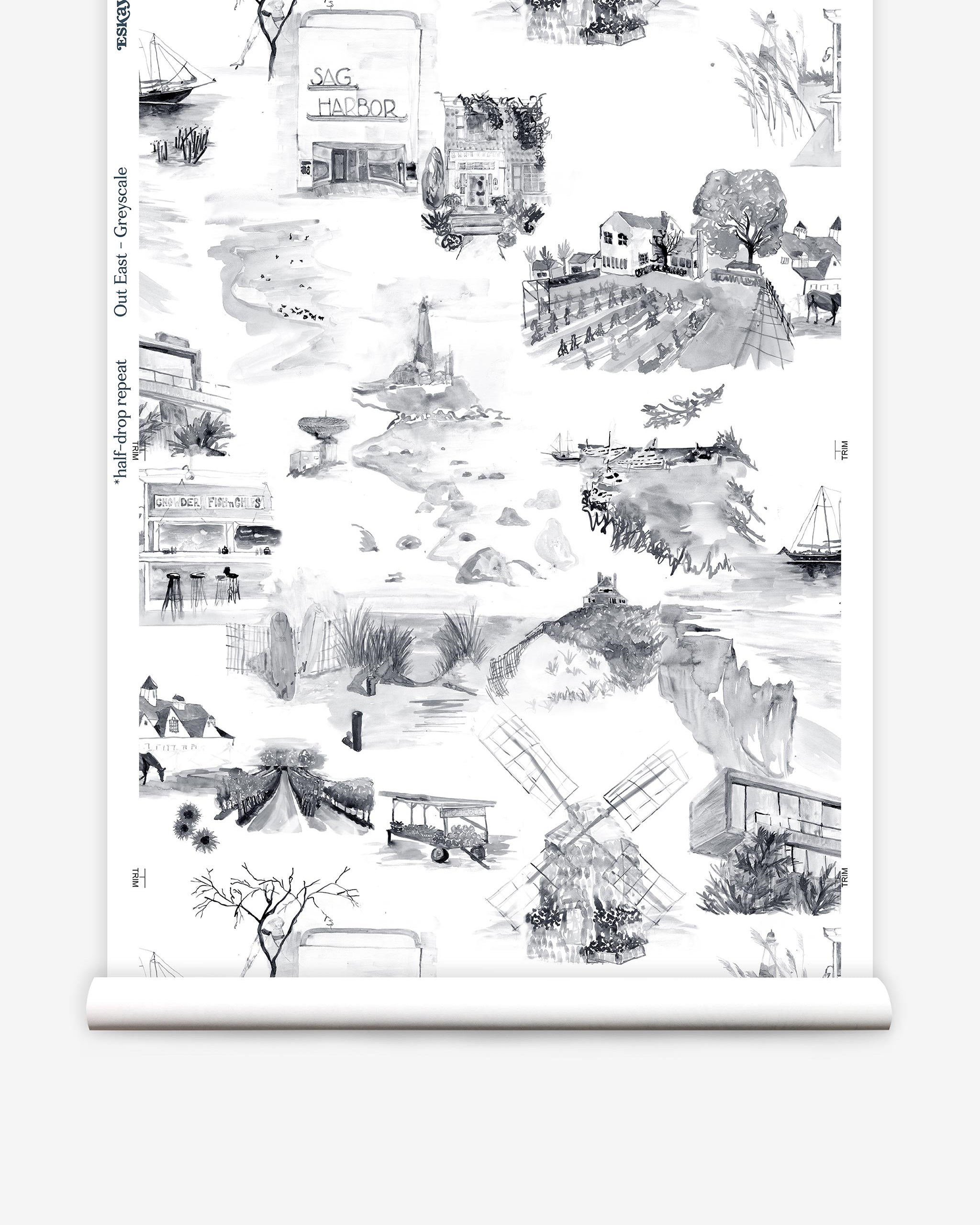 Partially unrolled wallpaper yardage in a playful illustrated city print in gray, black and white.