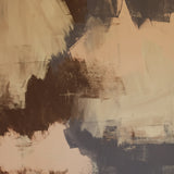 Detail of wallpaper in an abstract paint print in shades of tan, gray and brown.